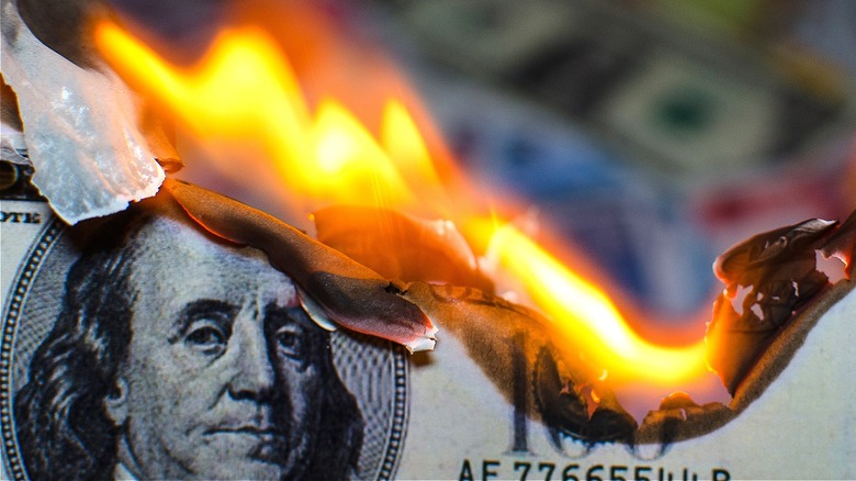 money on fire burning