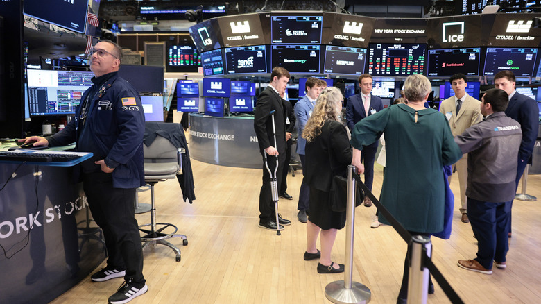 People trading equities on the stock exchange