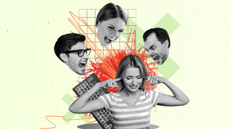 Woman closing her ears to people talking around her