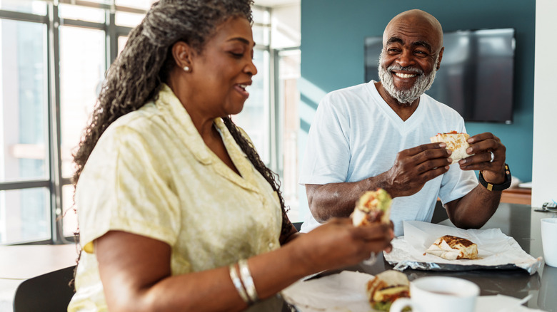 older couple eating breakfast