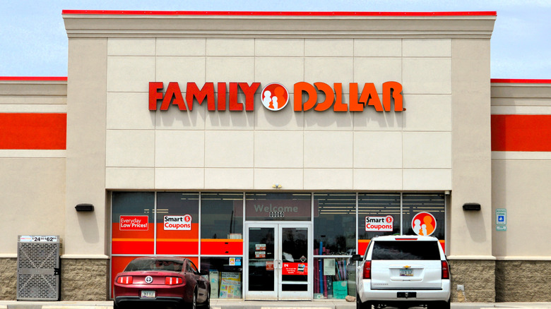 two cars parked outside a Family Dollar store
