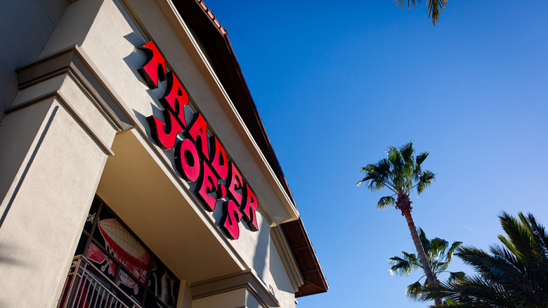 The front entryway of a Trader Joe's store on a sunny day