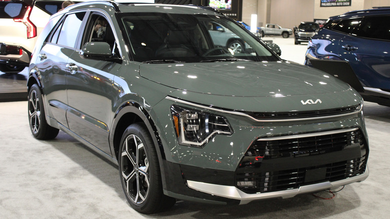 A 2024 Kia Niro Plug-In Hybrid on the floor at a dealership