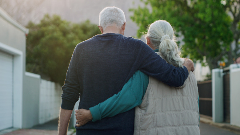 A mature couple walking