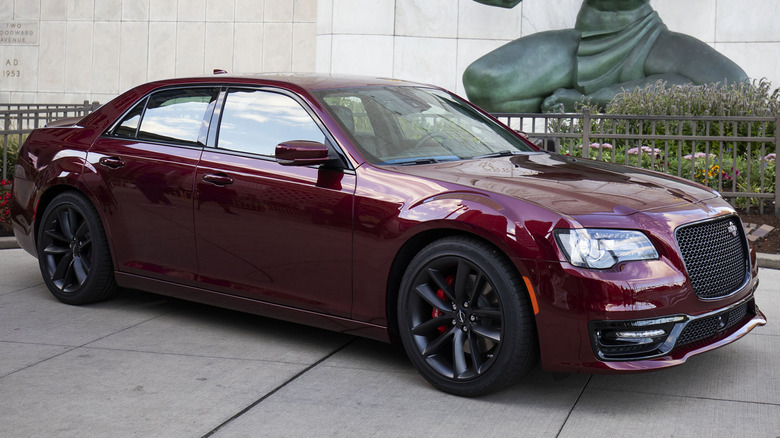 A maroon Chrysler 300C parked outside the Coleman A. Young Municipal Center in Detroit, Michigan