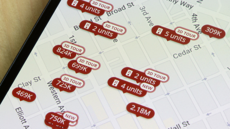 Zillow listings on a map shown on phone screen